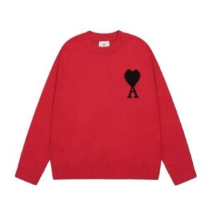 AMIRI's red sweater with a heart design.