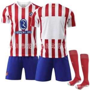 Atletico Madrid's red and white striped football jersey.