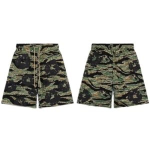 DENIM TEARS camouflage-style shorts