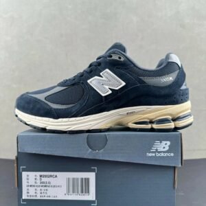 New Balance 2002R retro style navy blue shoes