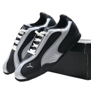 PUMA retro-style black and grey sports shoes