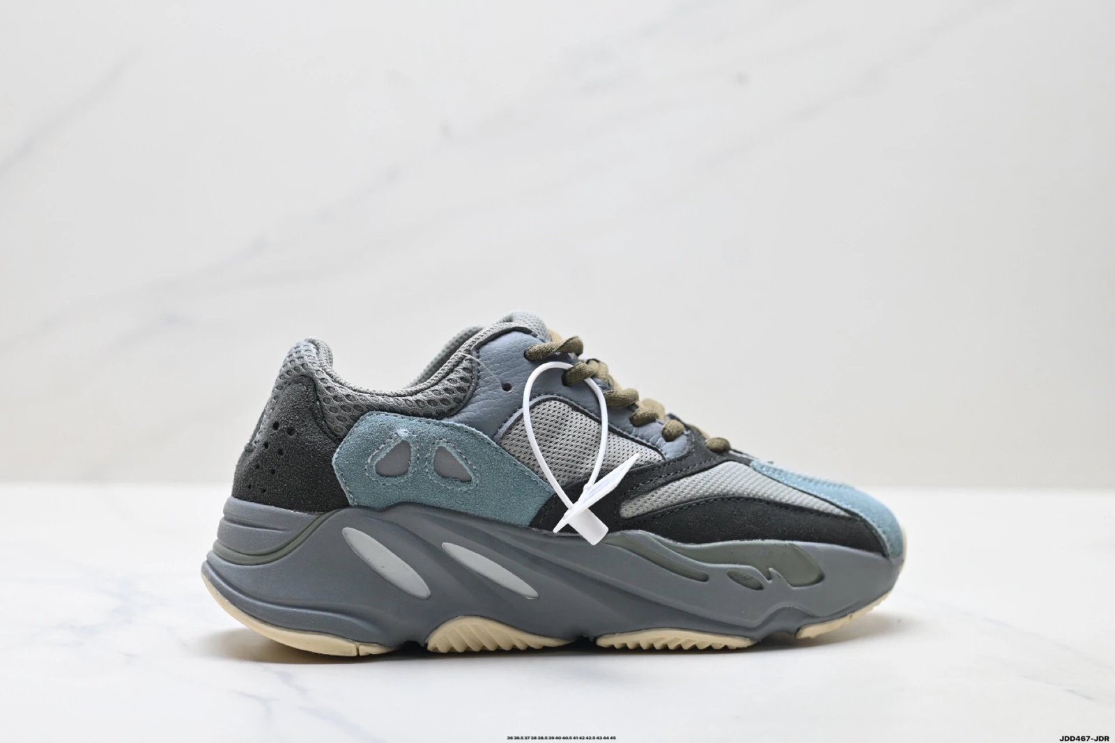Retro - style gray - blue Yeezy 700 sports shoes.