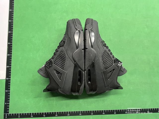 AJ4 Black Cat QC Photo - Detailed quality check showing leather texture and stitching