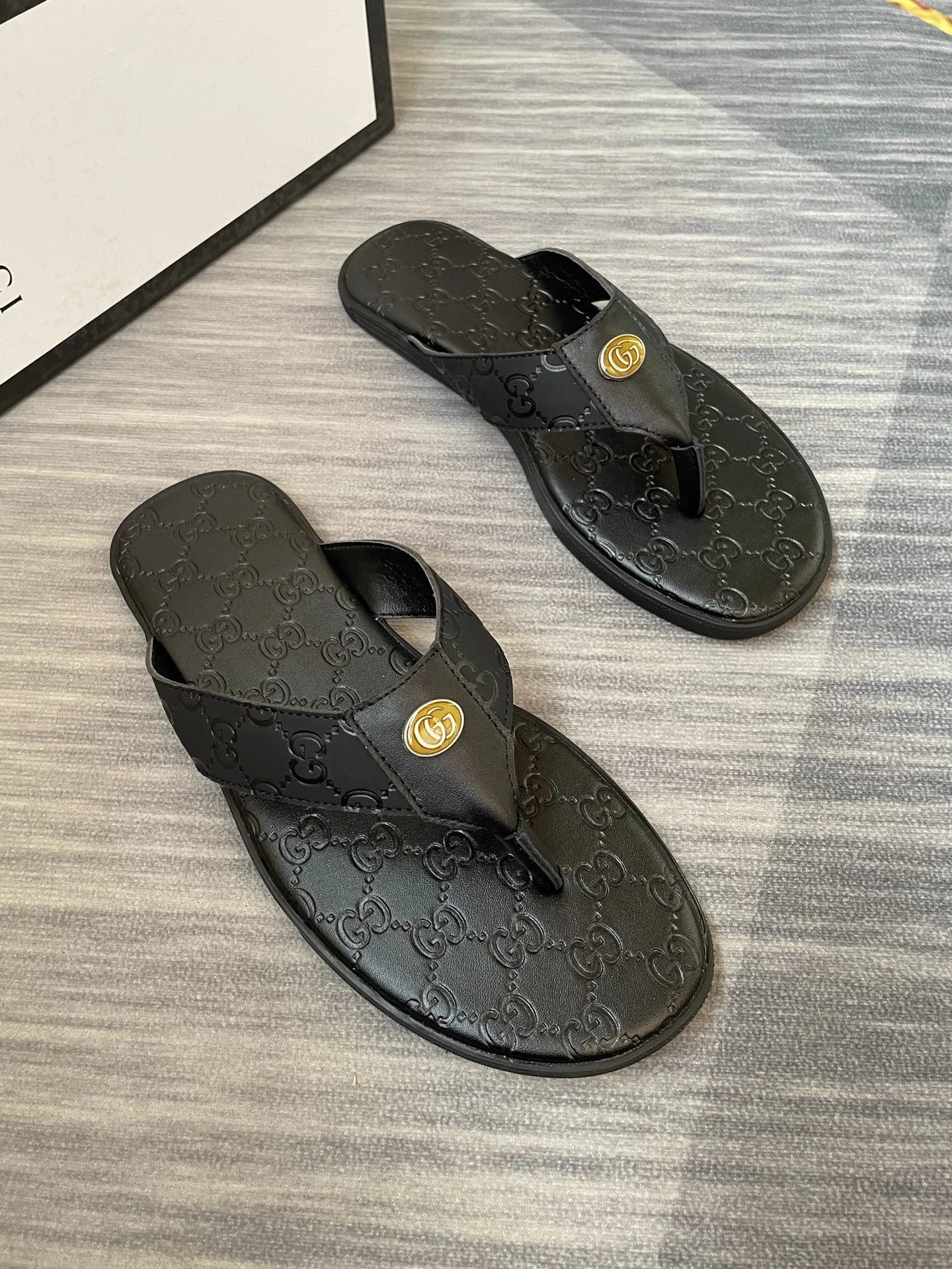 Gucci GG Embossed Light Luxury Style Black Flip-Flops